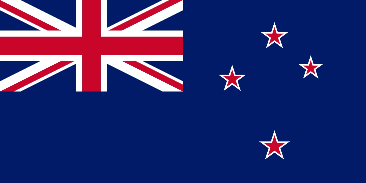 Flag of New Zealand showing the Union Jack in the upper left and four red stars with white borders on a blue field (Southern Cross).